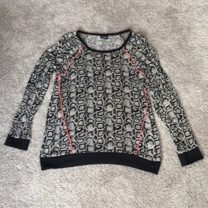 Snakeskin print long sleeve tee.